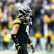 Iowa defensive back Dane Belton (4) reacts after a stop during a NCAA Big Ten Conference football game against Minnesota, Saturday, Nov. 13, 2021, at Kinnick Stadium in Iowa City, Iowa.